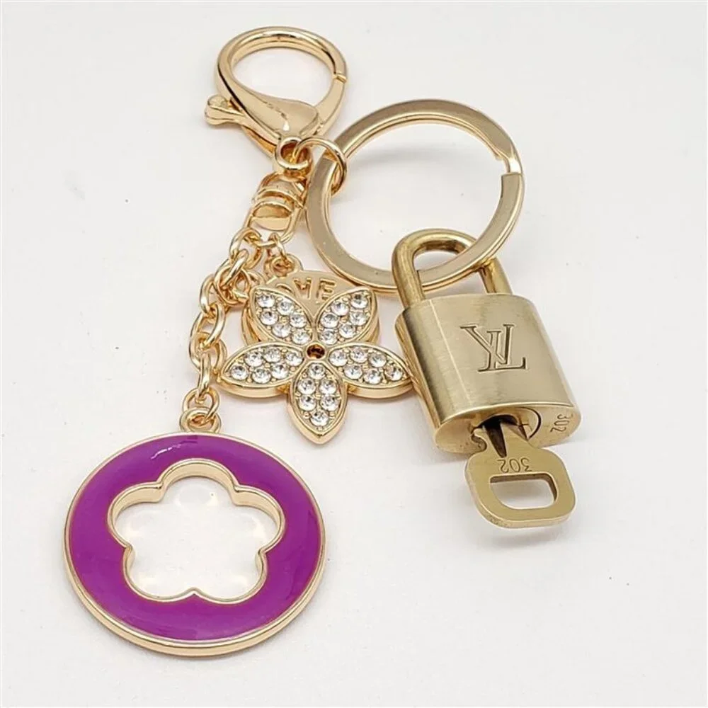 Authentic Louis Vuitton Lock & Key with Unbranded Flower Charm, Keychain - Picture 9 of 9